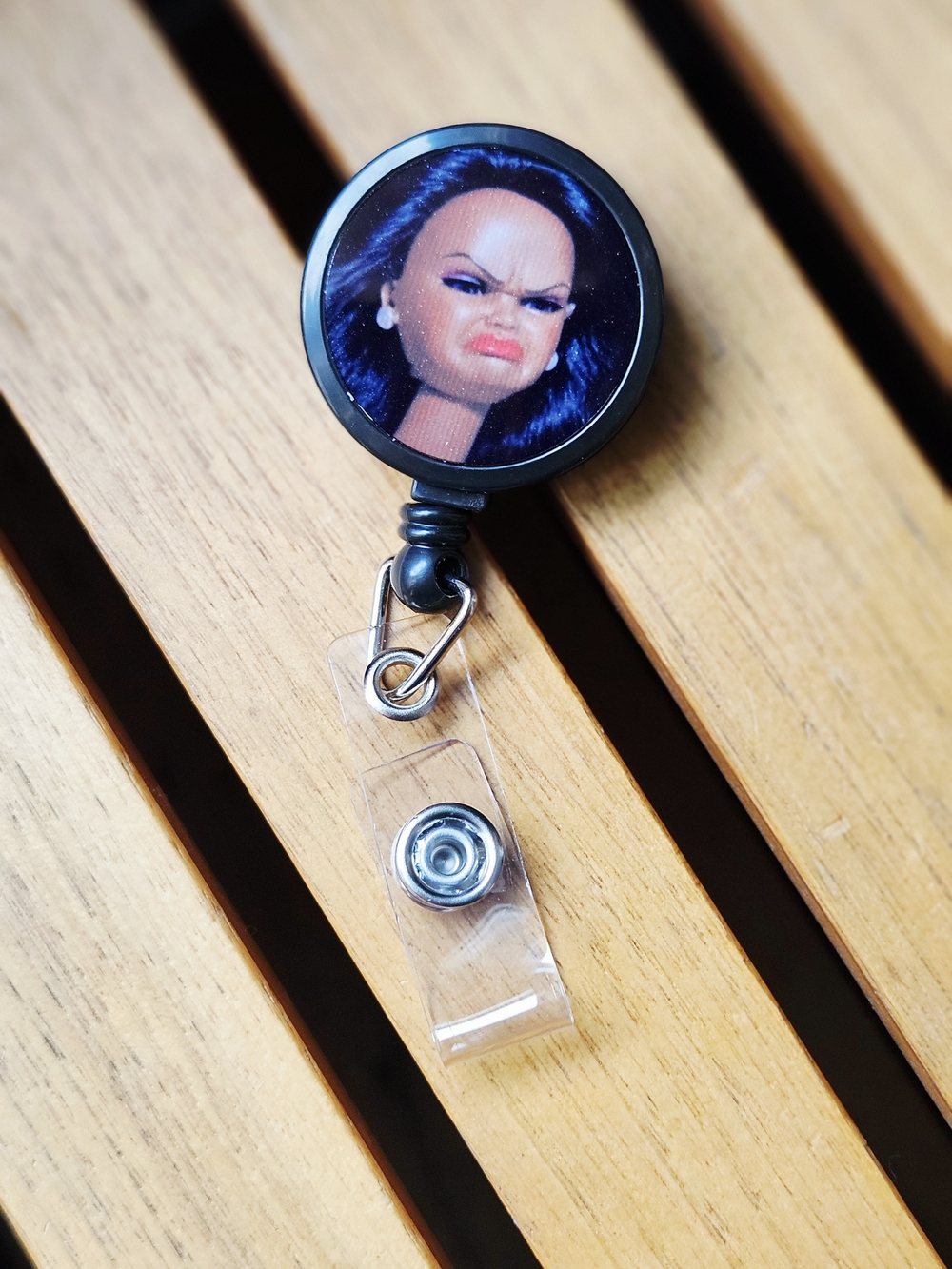 Retractable Badge Reel with Doll Face Graphic
